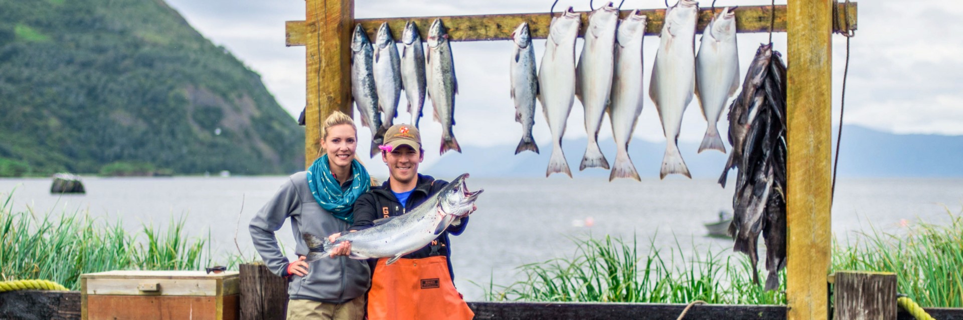 couple-holding-fish-daily-catch-wide-1920×639 kodiak alaska fishing