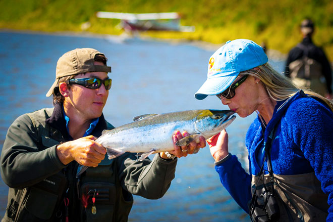 alaska river fishing fish kiss